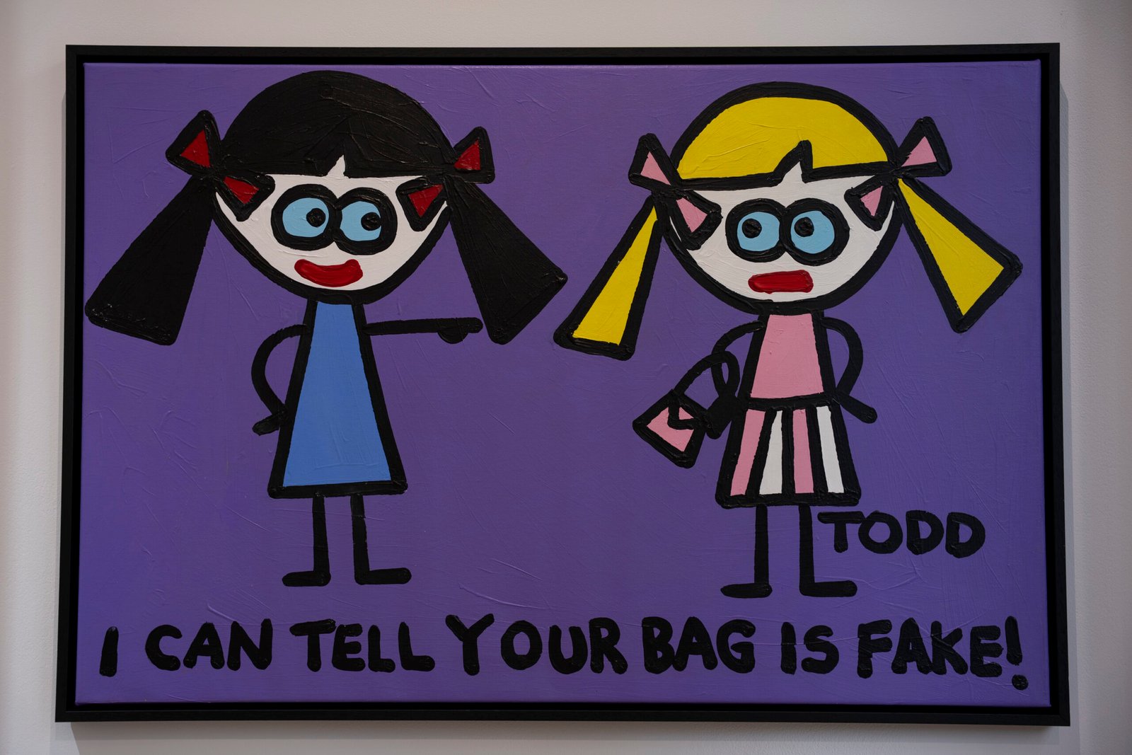 Todd Goldman art showing two cartoon women beside the words I Can Tell Your Bag Is Fake on a purple background